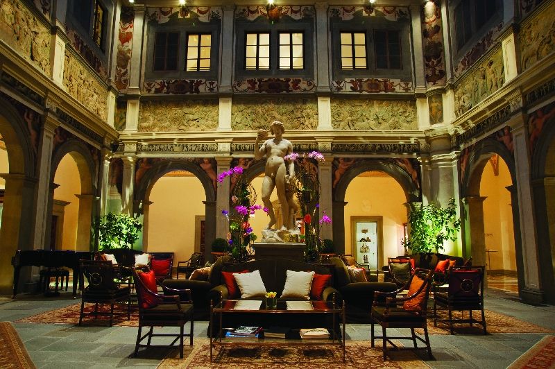 Berti enters the Four Seasons Hotel in Florence